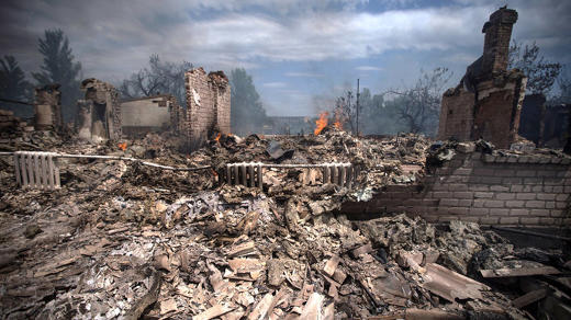 Maison détruite par une frappe aérienne de l'armée ukrainienne dans le village de Stanitsa Luganskaya le 2 juillet 2014 (photo AFP).