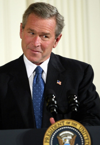 US President George W. Bush makes a few